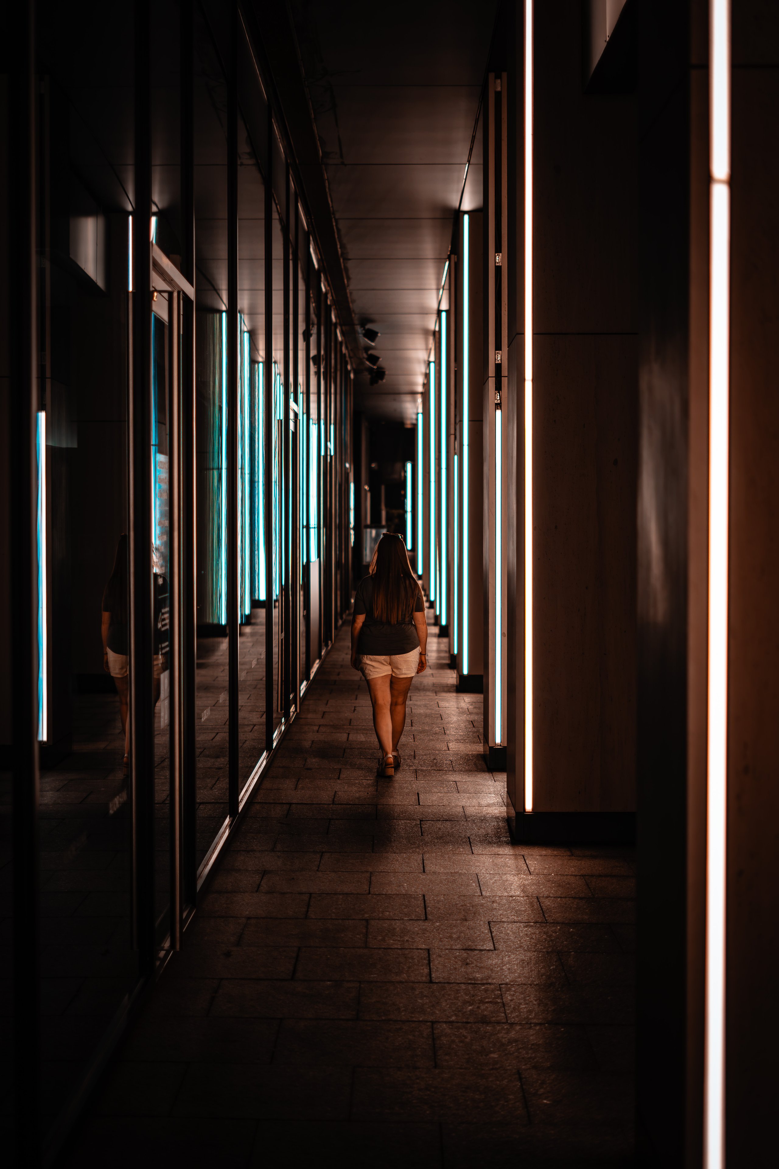 Lady walking through a commercial building