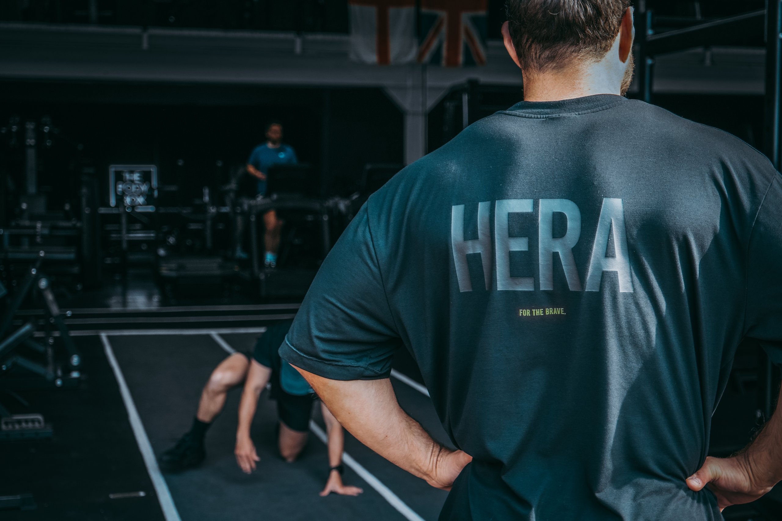 Man resting wearing a HERA t-shirt